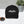 Charger l&#39;image dans la galerie, casquette moto noire stikare.com logo avant brodé blanc (vue face posé bureau)
